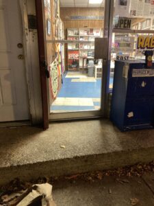 One step up to the DR Center with no railing.